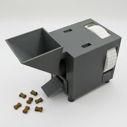 Gray Interactive slow feeder dog and cat food and treat dispenser.