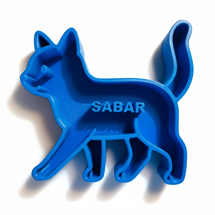 Blue cat-shaped dog and cat bowl with 'SABAR' name on a white background