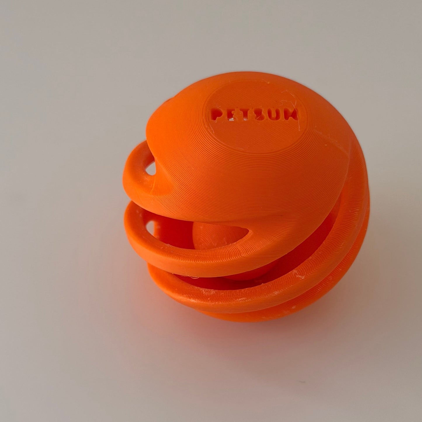 Orange Ball in ball cat and dog toy with 'Petsun' branding on a white background