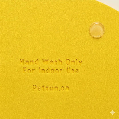 Yellow slow feeder bowl's back with 'Hand Wash Only For Indoor Use' text and PetSun.co logo.