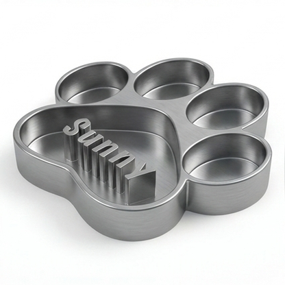 Gray paw-shaped dog bowl with 'Sunny' text on a white background