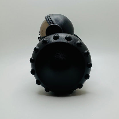 Black Robot Slow Feeder & Treat Dispenser Toy, side view of the spiked wheel