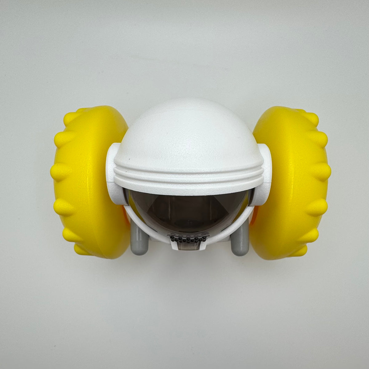 Yellow Robot Slow Feeder & Treat Dispenser Toy, top view of the white helmet
