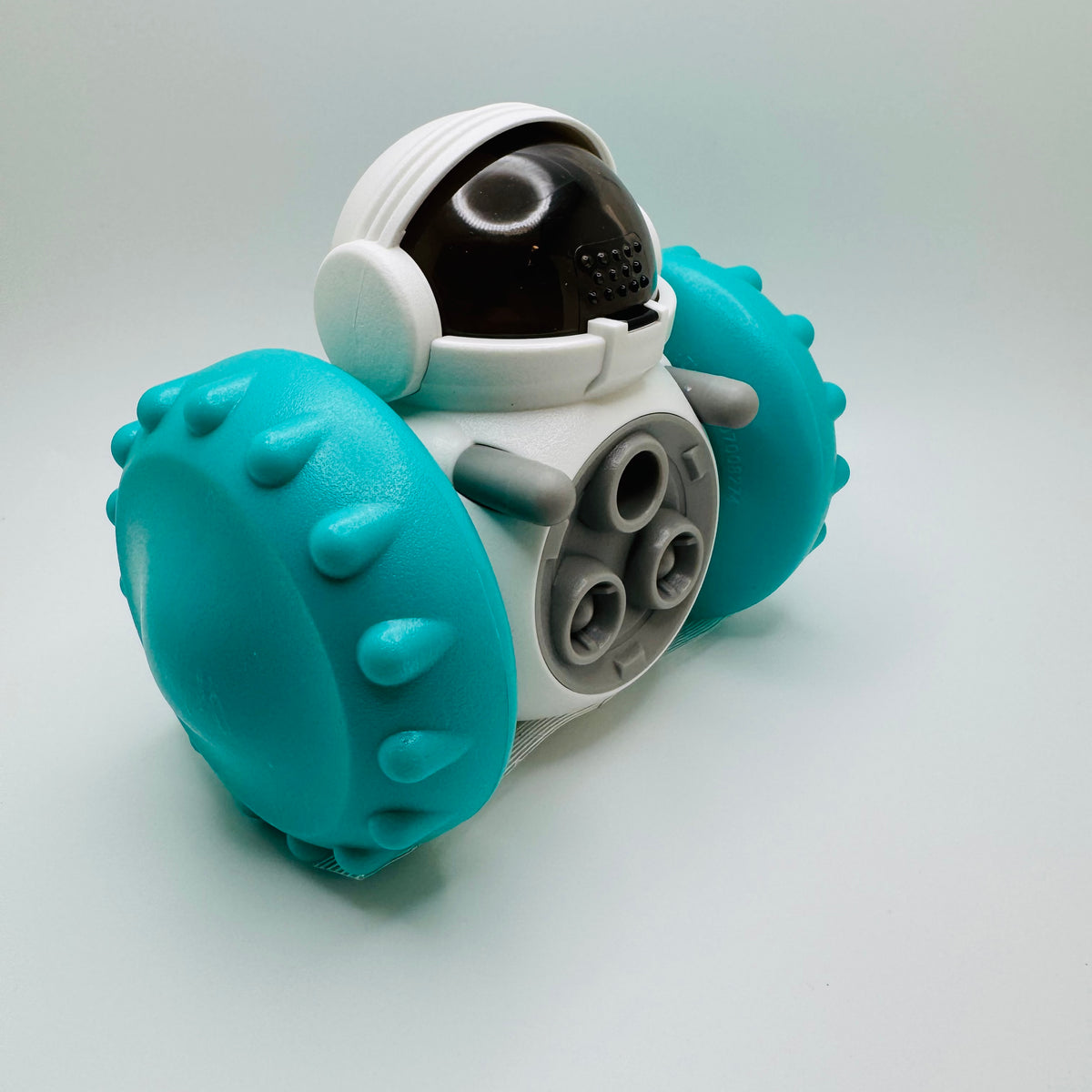 Teal Robot Slow Feeder & Treat Dispenser Toy, angled front view with three treat holes