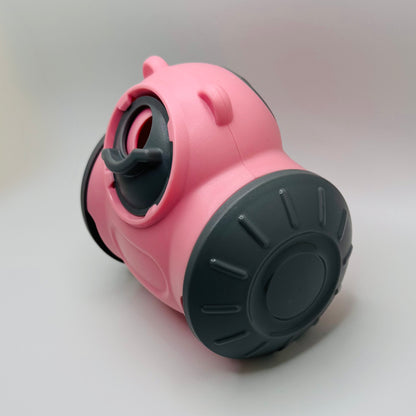 Pink Bear Slow Feeder & Treat Dispensing Toy for dogs, angled side view showing the grey wheel