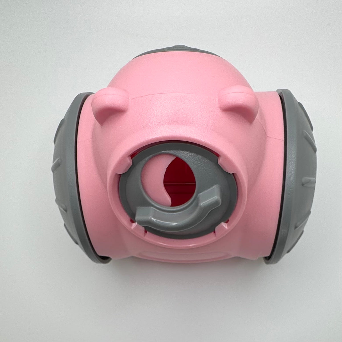 Pink Bear Slow Feeder & Treat Dispensing Toy for dogs, front view of the treat opening