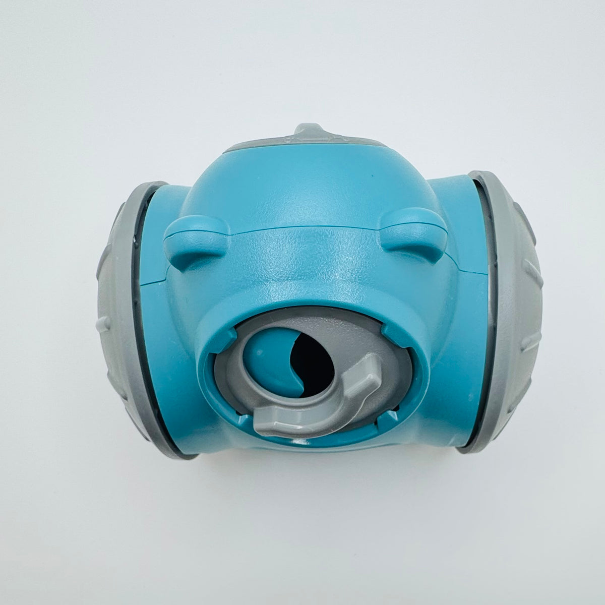 Light blue Bear Slow Feeder & Treat Dispensing Toy for dogs, front view of the treat opening