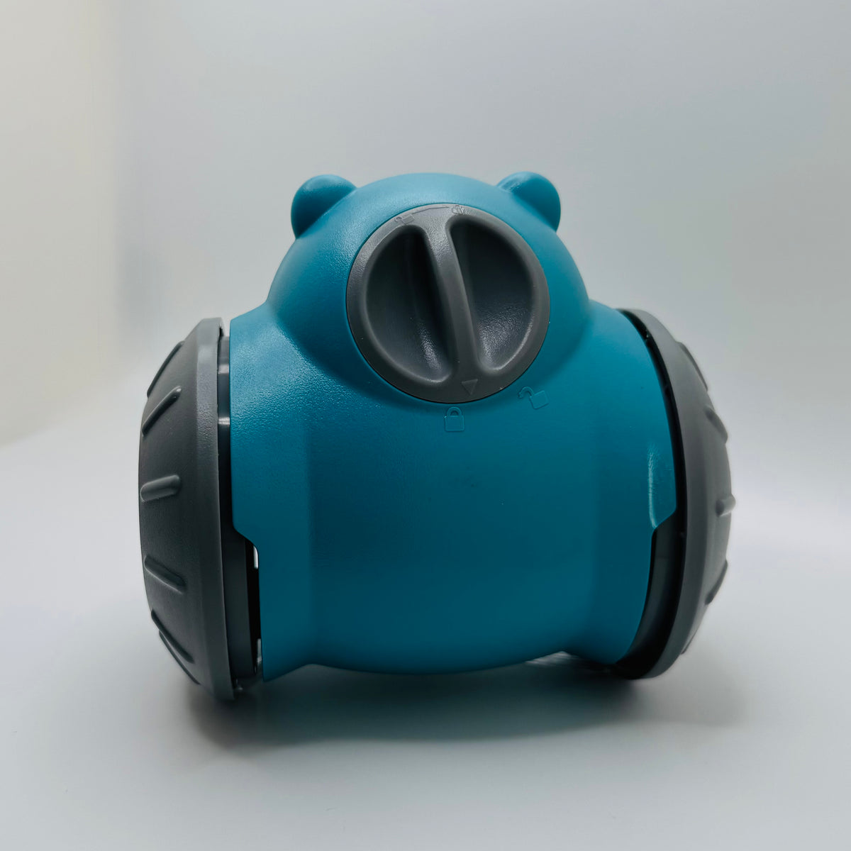 Teal Bear Slow Feeder & Treat Dispensing Toy for dogs with the opening turned closed