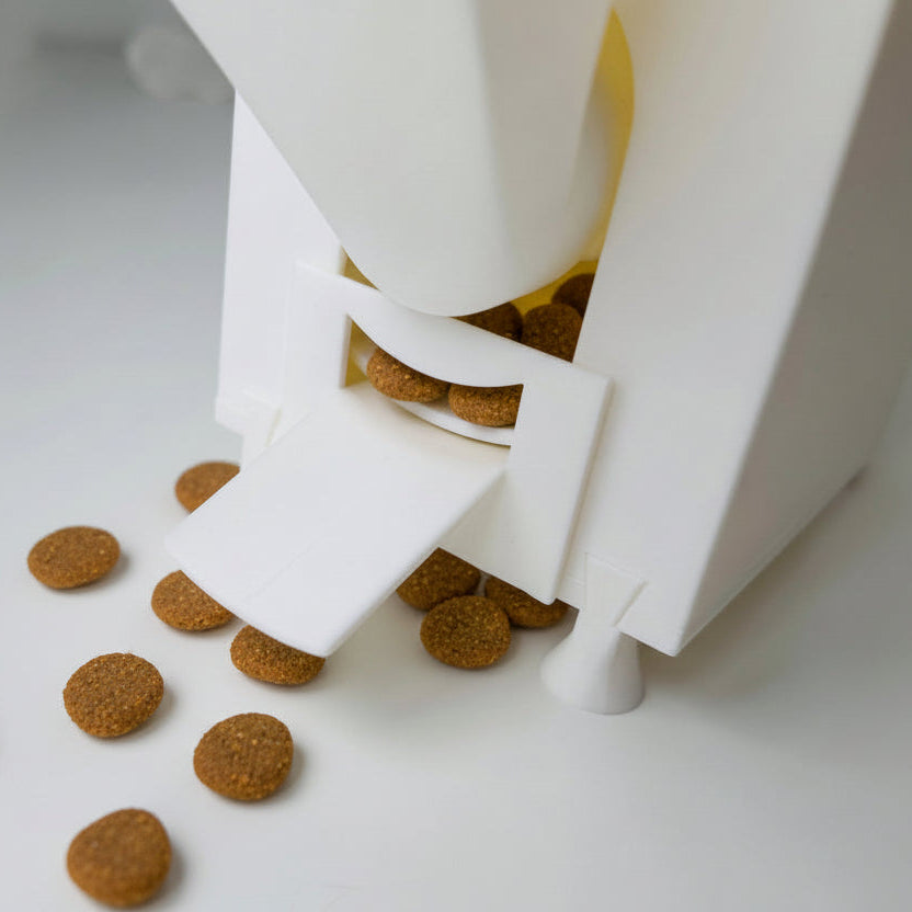 rotary interactive slow feeder with kibbles