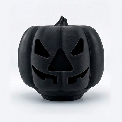 Black pumpkin treat dispenser for dogs and cats with carved jack-o'-lantern face