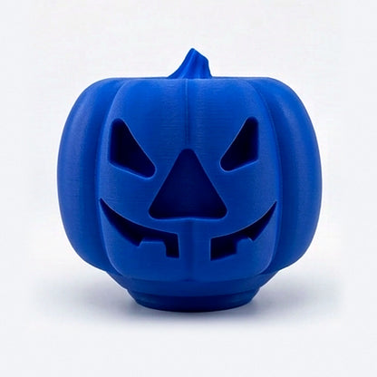 Blue pumpkin treat dispenser for dogs and cats with carved jack-o'-lantern face