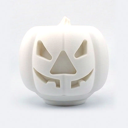White pumpkin treat dispenser for dogs and cats with carved jack-o'-lantern face