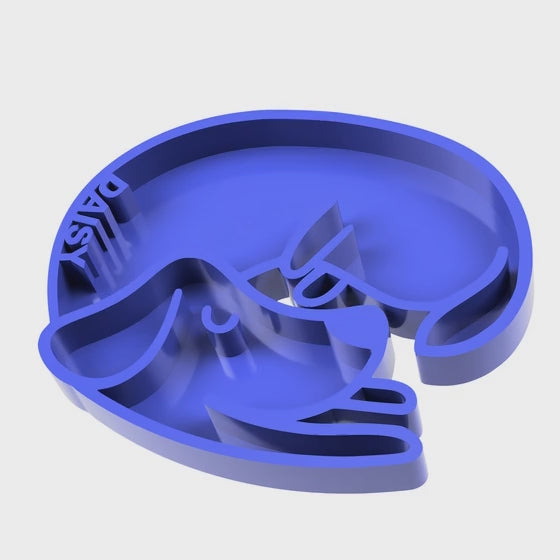 a dog eating from a personalized dog slow feeder bowl.